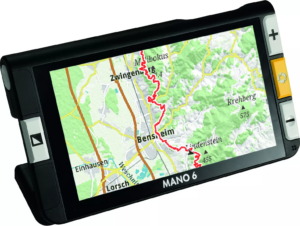 A small, rectangular device with a colorful map on the screen. The screen displays roads and locations in various colors. Attached to the device is a long, black handle extending to the right.